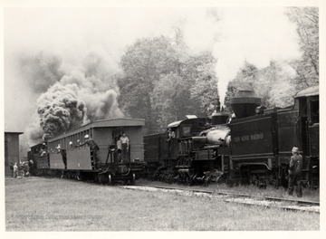Bald Knob Trains: 2nd Car Brakeman, Robert Long; Conductor,  Gearold Cassoll;<br />Standing on rear platform: Ken Caplinger; Cab of No. 7, Artie Barkley; On ground, right foreground,  "Doc" Carlson; photograph from John P. Killorah, Promotion Officer, WV State Parks, Chas, WV 25305.