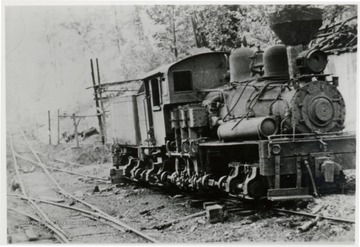 3/4 front view of Shay train engine.