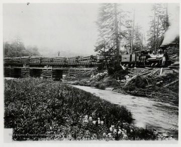 Shay No. 3 train engine on a wooden trestle.  Lima Shay, shop/order No. 754 W.Va. Spruce Lumber Company.  (Greenbrier and Elk River No. 3) T.K.A. 65 ton - 3 Tu?k