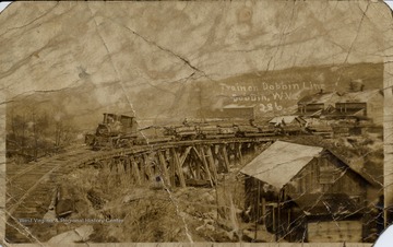 Postcard of train on Dobbin Line pulling log cars, Dobbin W.Va.
