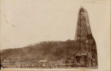 Large group of people gathered by the Big Moses Gas Well.