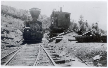 Shay locomotive traveling along tracks.