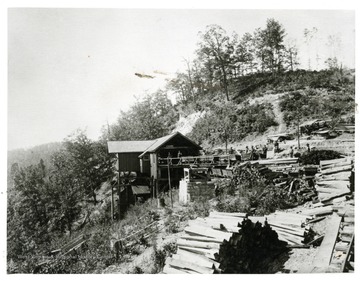 Men and lumber outside of the top head house at concho top community, Thurmond Coal Co. 