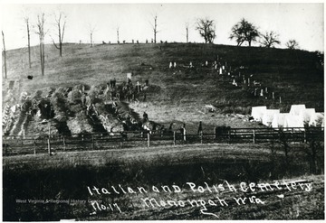 People being buried in an Italian and Polish cemetery after the Monongah Mine Explosion. 