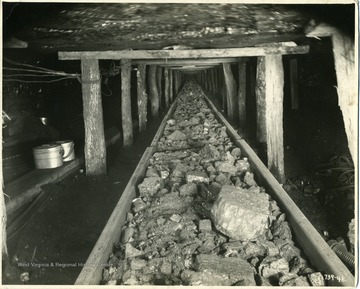 'View from point at which scraper was working; looking through conveyor to heading a distance of 300 ft.'
