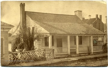 'Greenbrier County's First Courthouse, erected in 1778 (of stone) and occupied up to 1820, and then converted into a private residence by Wm. Smither, a shoemaker.'