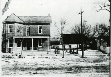 'On left - Mill house built by N.S. Martin.  On right - Shepherdstown, W. Va. flower mill and saw mill on extreme right.'<br />