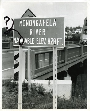 Misspelled sign by the Star City Bridge should have read: Monongahela River Navigable elevation 828 feet. The word navigable is misspelled.