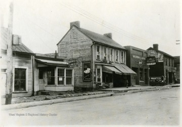 'Looking N. W. on University Ave. to corner of Same and Moore St.  Showing frontage of Lepera Property.'