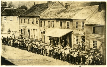 Men are lined up on Carrico Corner due to the 'Call to Arms' for the Civil War.