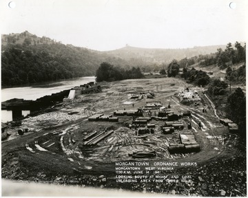 '11:00 A.M. June 14, 1941.  Looking south at wharf and coal unloading area from tower No. 3. Photograph Number 138.'