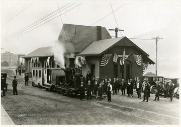 'B and O R. R. Station.  First B and O train.'