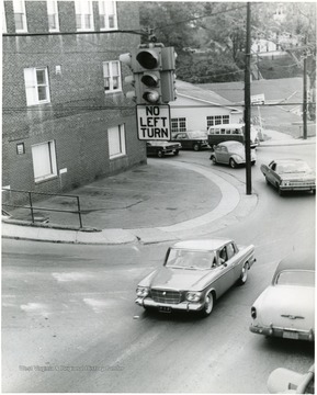 Cars on University Avenue near the old Mountaineer Field.