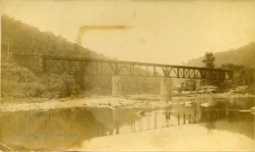 View of the Iron Bridge at Whitcomb Depot, C. and O. Railroad on a low water area of the Greenbrier River in Greenbrier County.