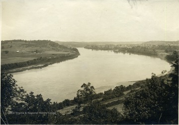 'The Ohio River, showing the bend at Ravenswood and the Ohio side of the river.  Ravenswood in the distance at right.'  From photo album labeled 'Stewart A. Cody, County Agent, Jackson County, 1912.'