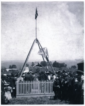 View of the unveiling of the Confederate Monument at Valley Mountain near the Marshall Farm at Mingo Flats.  The occasion recognized General Robert E. Lee's nearby 1861 campsite and the Confederate dead of the areas.  Present for the occasion were: Mr. and Mrs. Edgar D. Wamsley, Zano Simmons, Jake G. Simmons, Ellen B. McDonald, Reverand William E. Hudson, M. Hart Wamsley, Joe See, James Ware, Mary Crouch, and George Fisher.