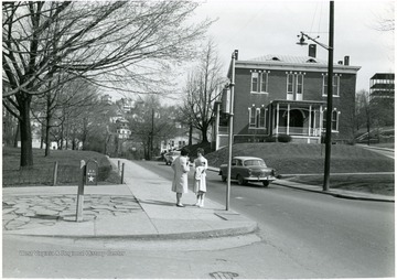 Female students across the street from the Agricultural Experiment Station building.