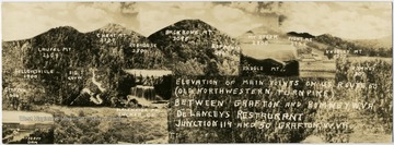 Mountains on U.S. 50, also known as Old Northwestern Turn Pike. The postcard has an advertisement for DeLancey's Restaurant in Grafton.