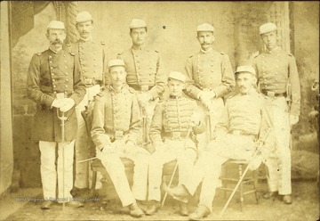 Major James M. Lee commandant on far right poses with his cadets officers. Standing next to the Major is Robert Hall Armstrong, Adjutant. 