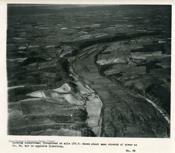 'Looking downstream; foreground at mile 157.7; shows about same stretch of river as No. 34, but in opposite direction.'