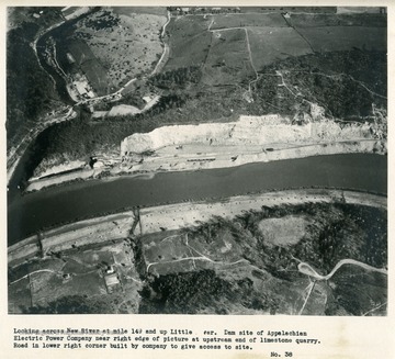 'Looking across New River at mile 149 and up Little River.  Dam site of Appalachian Electric Power Company near right edge of picture of upstream end of limestone quarry.  road in lower right corner built by company to give access to site.'