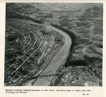 'Radford, Virginia, looking southwest at mile 144.2.  New River depot at right; main line of Norfolk and Western.'