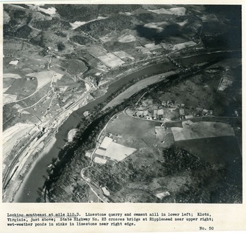 'Looking southeast at mile 110.3.  Limestone quarry and cement mill in lower left; Klotz, Virginia, just above; State Highway no. 23 crosses bridge at Ripplemead near upper right; wet-weather ponds in sinks in Limestone near right edge.'