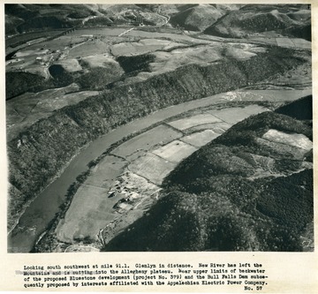 'Looking south southwest at mile 91.1.  Glenlyn in distance.  New River has left the Mountains and is cutting into the Allegheny plateau.  Near upper limits of backwater of the proposed Bluestone development (project No. 379) and the Bull Falls Dam subsequently proposed by interests affiliated with the Appalachian Electric Power Company.'