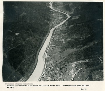 'Looking up Greenbrier River about half a mile above mouth.  Chesapeake and Ohio Railroad at left.'
