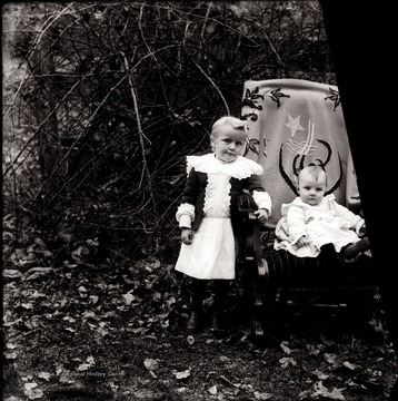 A portrait of two children taken outdoors in Helvetia, W. Va.