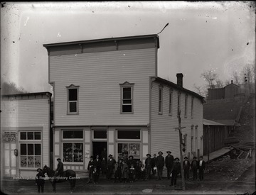 Pickens business pictured are D. G. Thomas Grocers and McNeal's Saloon.