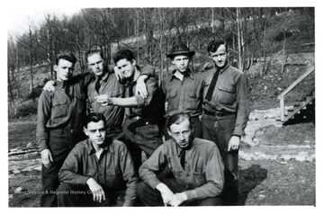 CCC 105. Unidentified young men, members of the C.C.C., pose for a group photo.