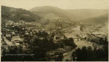 Postcard photograph from an elevated view of the Black Fork River as it flows through the town of Hambleton in Tucker County. Information included on the photograph, " Sold by O. C. M. Co. Drug Dpt.".