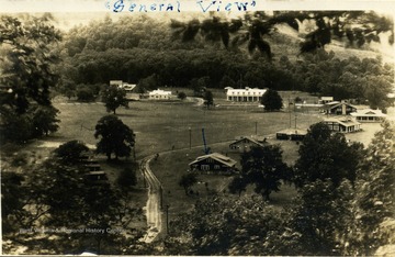 Post card print of an elevated view of the 4-H Camp at Jackson Mills. Roald Moyers sent the card to his sister, Theda in Harrisonburg, Virginia.