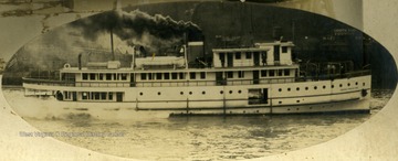 Steam towboat made by Charles Ward Engineering Works of Charleston, West Virginia. Note behind the boat, on the bank, left is the Ward Boilers Factory and on the right is the South Side Foundry.