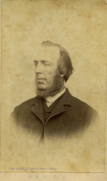 A carte de visite of a bearded W. H. K. Dix wearing a suit.