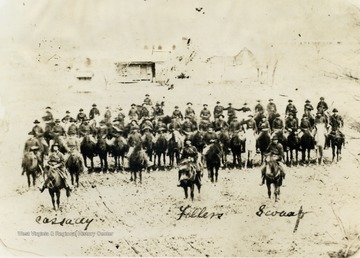 Group portrait of mounted Company G. The three officers identified are L to R: Captain James S. Cassady, First Lieutenant James D. Fellers, and Second Lieutenant John E. Swaar. Other soldiers are not identified 