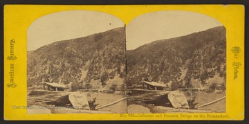 An unidentified man sits on Jefferson Rock above the Shenandoah River at Harpers Ferry. A pontoon bridge has been laid across the river to temporarily replace the destroyed bridge. The bridge's piers can be seen rising out of the river.
