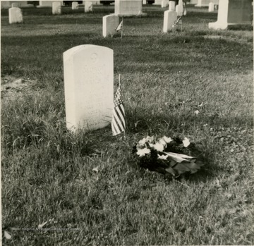 This is a photograph of the grave Lt. George M. Barrick Jr. He is buried in Arlington National Cemetery in Washington D.C.