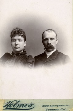 Hu and Anne Humphrey Maxwell pose for a photo.