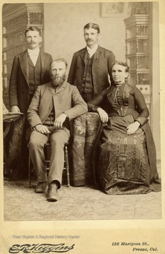 Sarah June Maxwell, and sons Hu(sitting) Frank and Edwin. 
