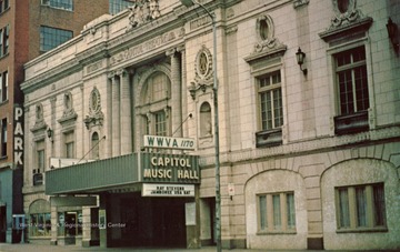 Caption on postcard reads: "Located in Downtown Wheeling, W. Va., this beautiful theatre features the top artists in Country Music each Saturday night. Broadcast over Radio Station WWVA, the world famous Radio Jamboree originated nearly 50 years ago. Symphony Orchestras, Broadway Plays and other entertainment events round out a full schedule."