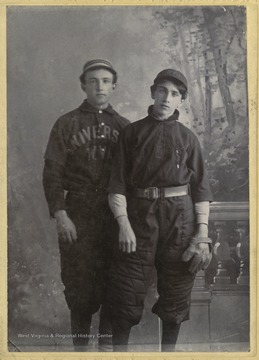 Two unidentified students in their West Virginia University baseball team uniforms. 