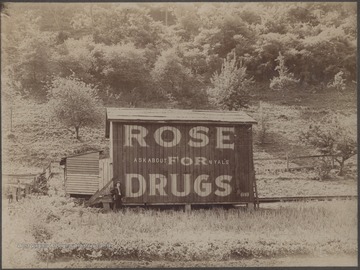 Rose with the advertisement on the south-side of Hinton near mouth of Madam's Creek.