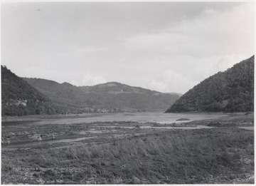 Looking at the beginning of a reservoir created by the Bluestone Dam. To the right of the area pictured is the mouth of the Bluestone River. 