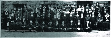 A group portraits outside of the high school building. Subjects unidentified. 
