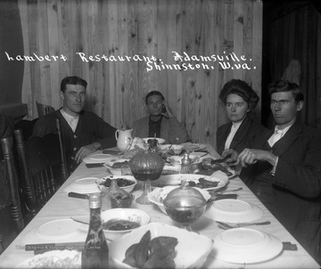 An unidentified groups sits down for dinner at the Lambert Restaurant in Adamsville, Shinnston, W. Va.