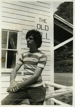 Lester Lind poses for a picture at the Old Mill Crafts Shop in Harmon, W. Va.The photos in this collection were used in chapters that appeared in Mountain Trace, a publication of Parkersburg High School in West Virginia, edited by Kenneth G. Gilbert.
