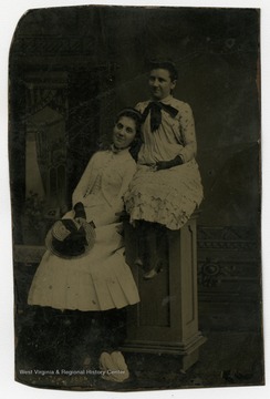 Portrait of Sadie West and an unidentified female from a photograph album of late nineteenth century images featuring residents from Keyser, W. Va.