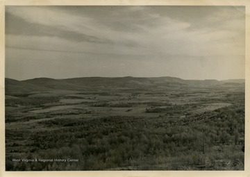 This image is part of the Thompson Family of Canaan Valley Collection. The Thompson family played a large role in the timber industry in Tucker County during the 1800s, and later prospered in the region as farmers, business owners, and prominent members of the Canaan Valley community.The location of this view is most likely in the Canaan Valley area.
